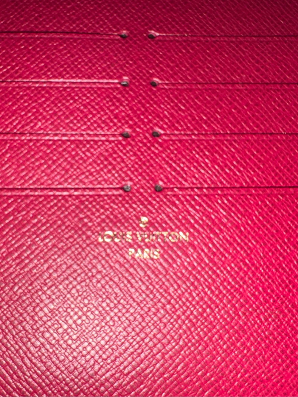 Louis Vuitton red textured leather cardholder with gold logo